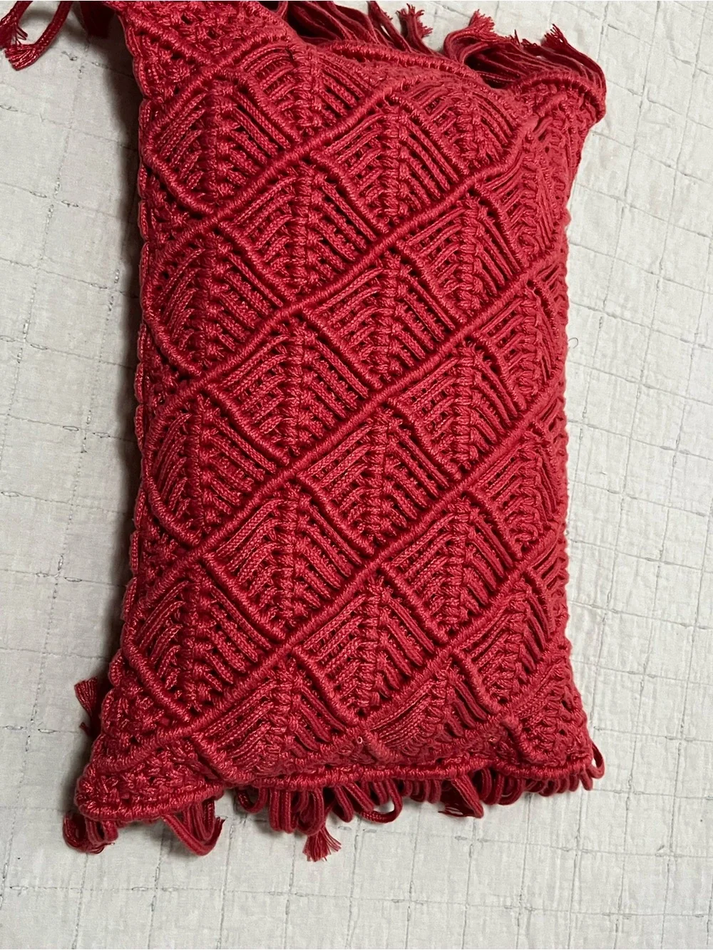 Textured macrame coral pillow